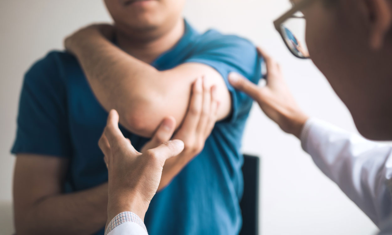 Doctor performing clinical assessment